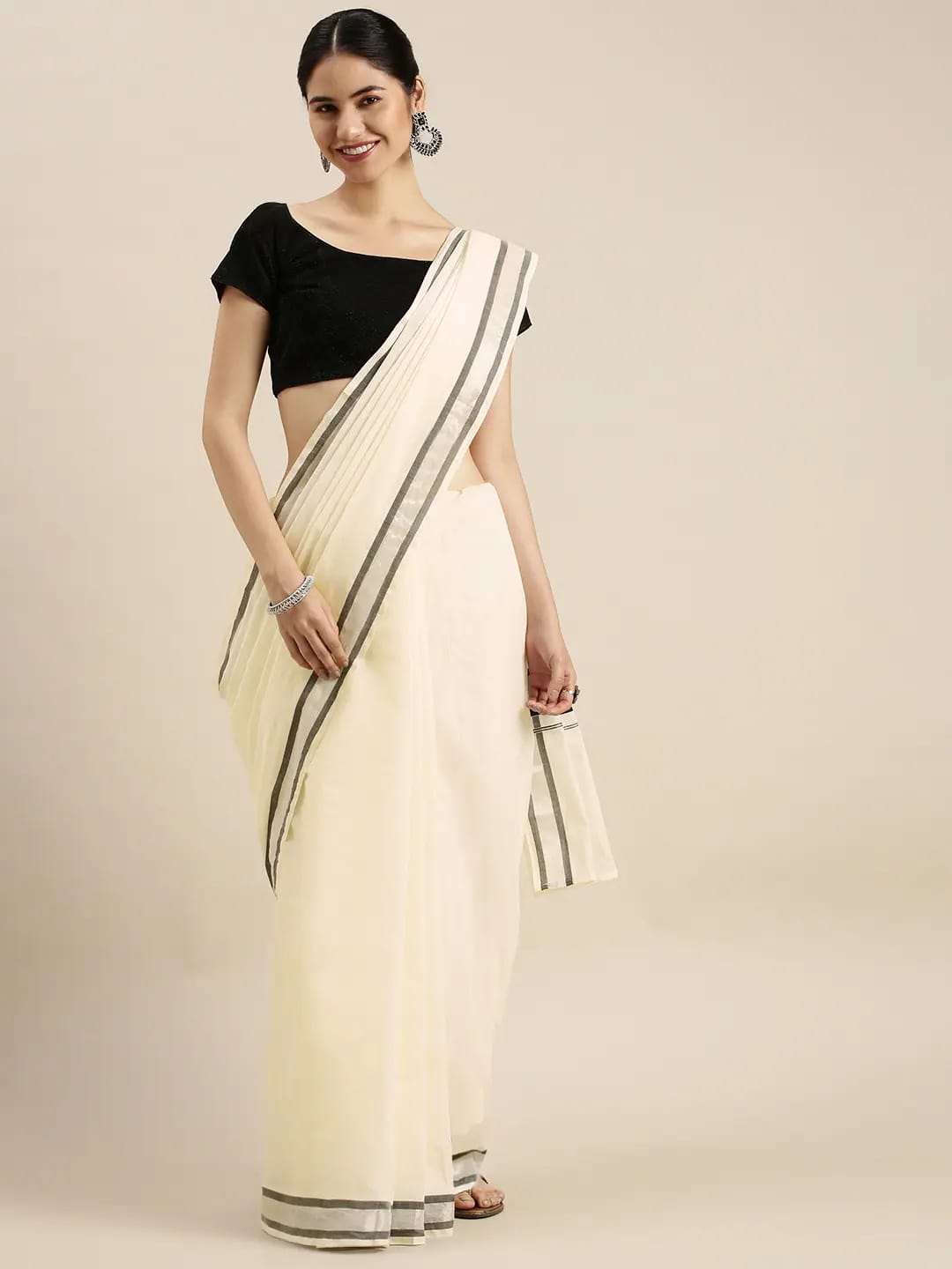 Tulasi - തുളസി (Traditional Onam Kasavu Saree)